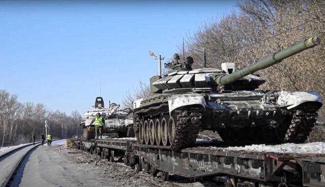 Screen capture from video by the Russian Defense Ministry press service showing tanks on trains leaving the Ukrainian border, February 16, 2022.