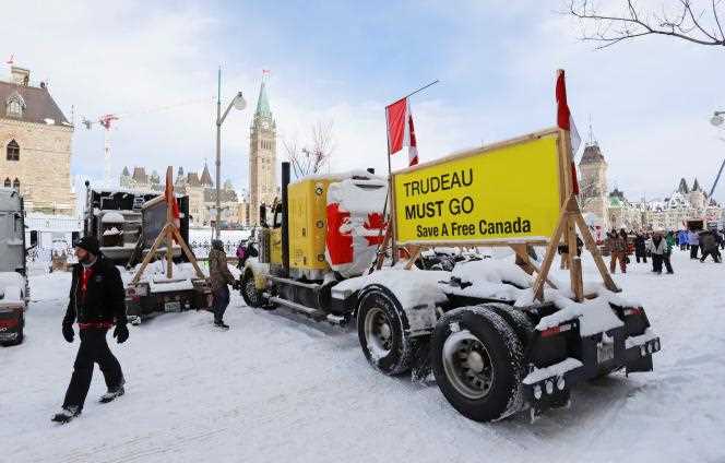 A truck leaves the streets of Ottawa as police begin a major operation to end blockades in the Canadian capital on February 19, 2022.