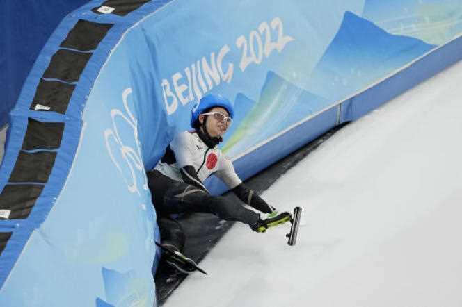 Japanese Nana Takagi falls during the mass start of speed skating at the Beijing Winter Games, February 19, 2022.