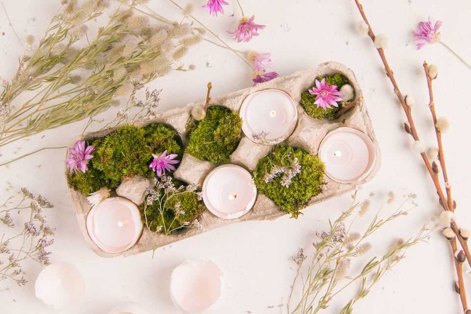 Make spring decorations: egg carton with moss and candles