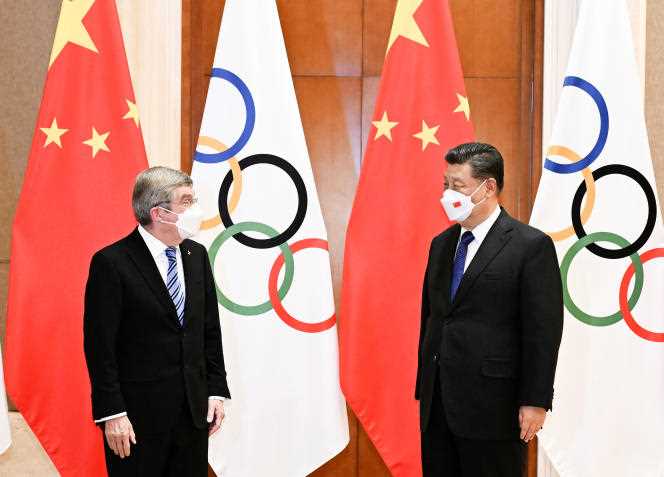 IOC President Thomas Bach, left, and Chinese President XI Jinping, at the Diaoyutaila in Beijing, the official residence of foreign dignitaries visiting China, January 25, 2022.