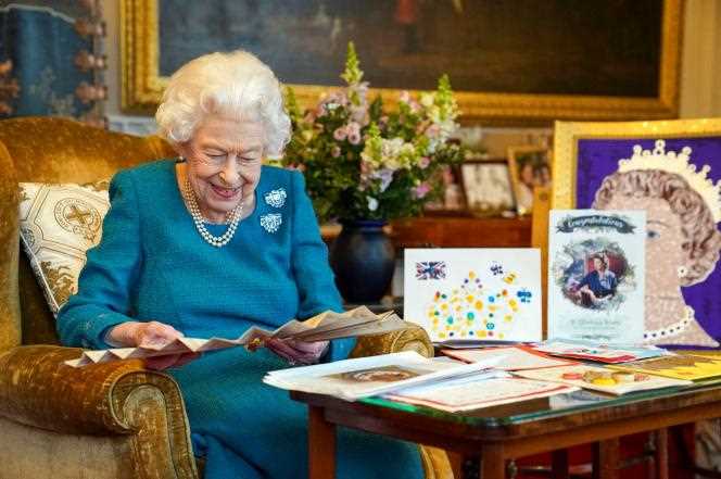 Queen Elizabeth II, surrounded by memorabilia from her Golden and Diamond Jubilees, at Windsor Castle, London, in January 2022.