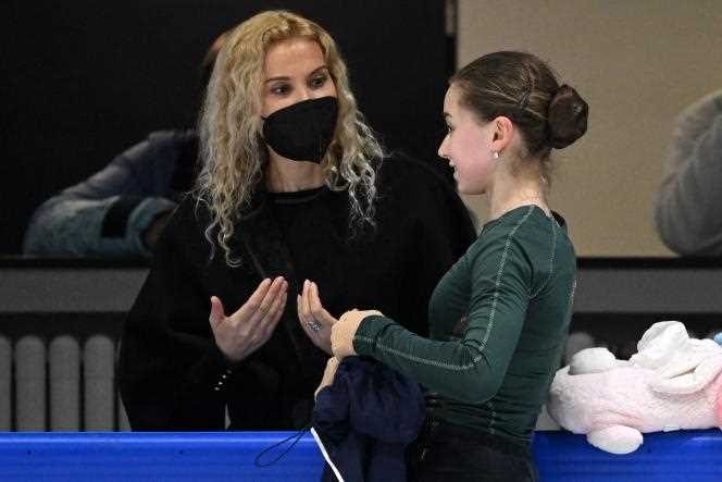 Eteri Tutberidze with Kamila Valieva, the young Russian skater suspected of doping with trimetazidine, at training on the ice in Beijing on February 12.