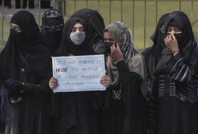 Indian Muslim women demonstrate against the ban on female students wearing hijab from attending classes in some schools in Karnataka state, Hyderabad, India, February 15, 2022.