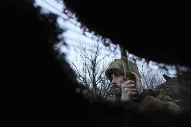 A Ukrainian soldier on the front line with pro-Russian separatists, near Zolote, Saturday February 19.