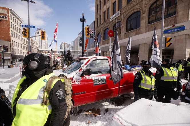 Canadian law enforcement removes participants in the illegal blockades from Ottawa, February 18, 2022.