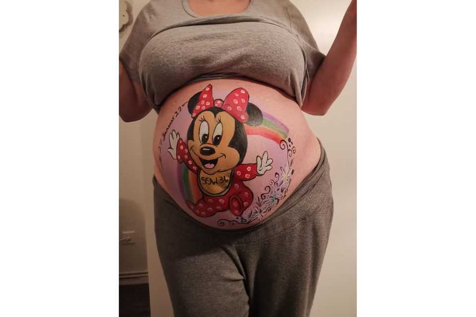 Paint the baby bump: Paint Minnie Mouse on the baby bump