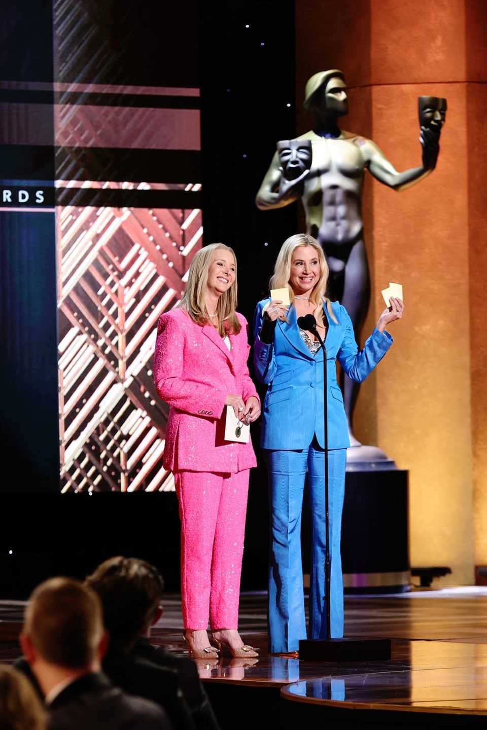 Lisa Kudrow and Mira Sorvino on stage at the 28th Screen Actors Guild Awards