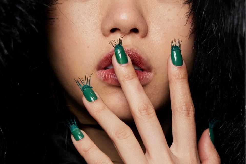The Lash Nails are presented at the Yuhan Wang Fall/Winter 2022 fashion show. 