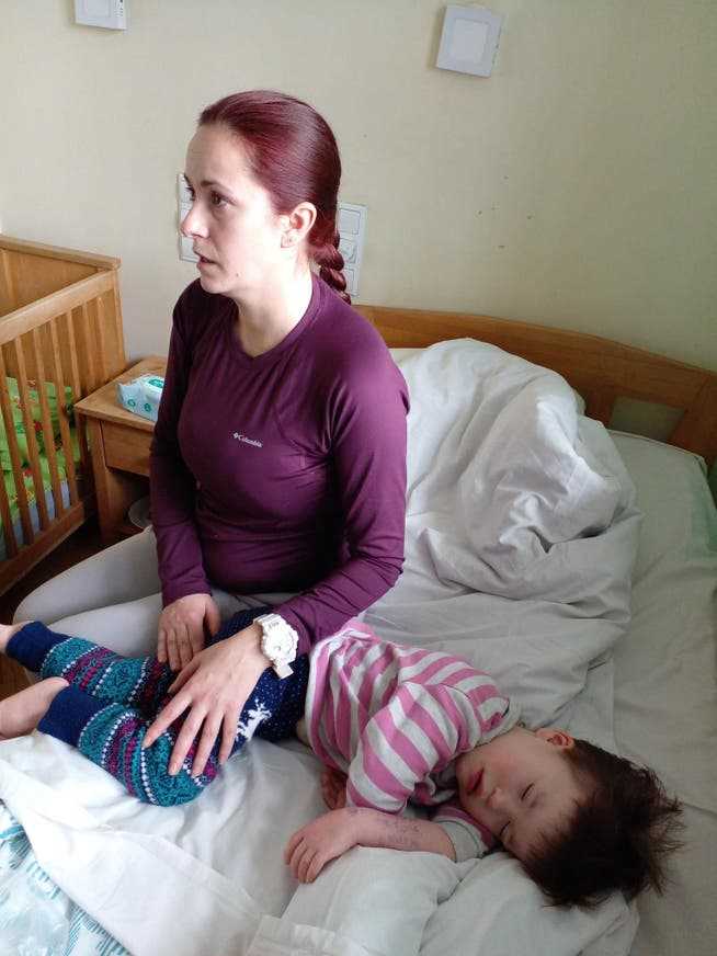 Olga fled Kharkiv with her sick daughter Yevheniya.  