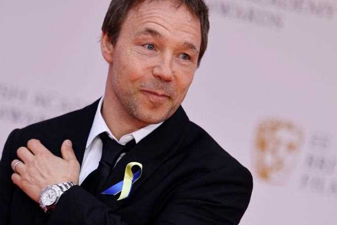 British actor Stephen Graham pinned a ribbon in the colors of Ukraine on the red carpet at the Bafta ceremony in London on March 13, 2022.