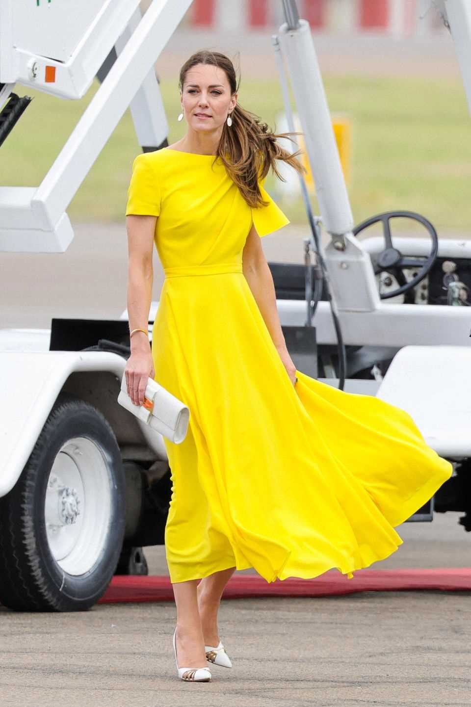Duchess Catherine in a lemon yellow upon arrival in Jamaica. 