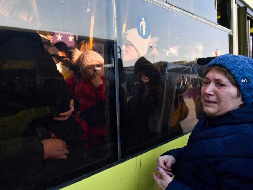 Refugees board the bus in Lviv.