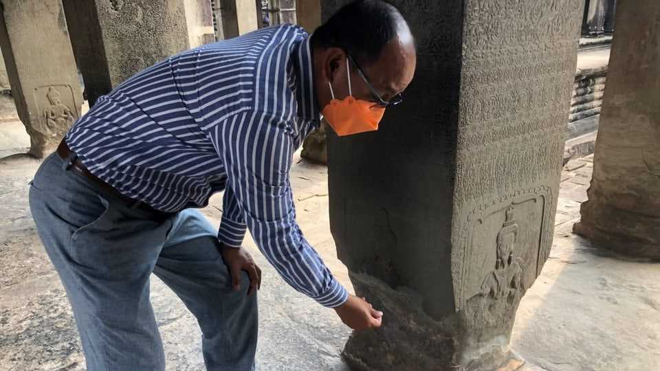 A stone pillar of the Angkor Wat temple complex has been damaged by the weather.