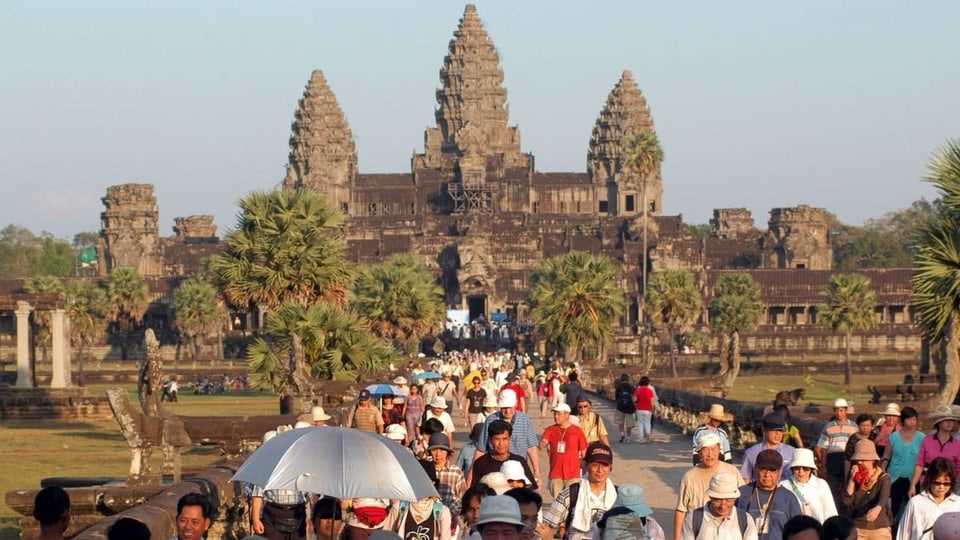 Mass tourism at the temples of Angkor Wat.