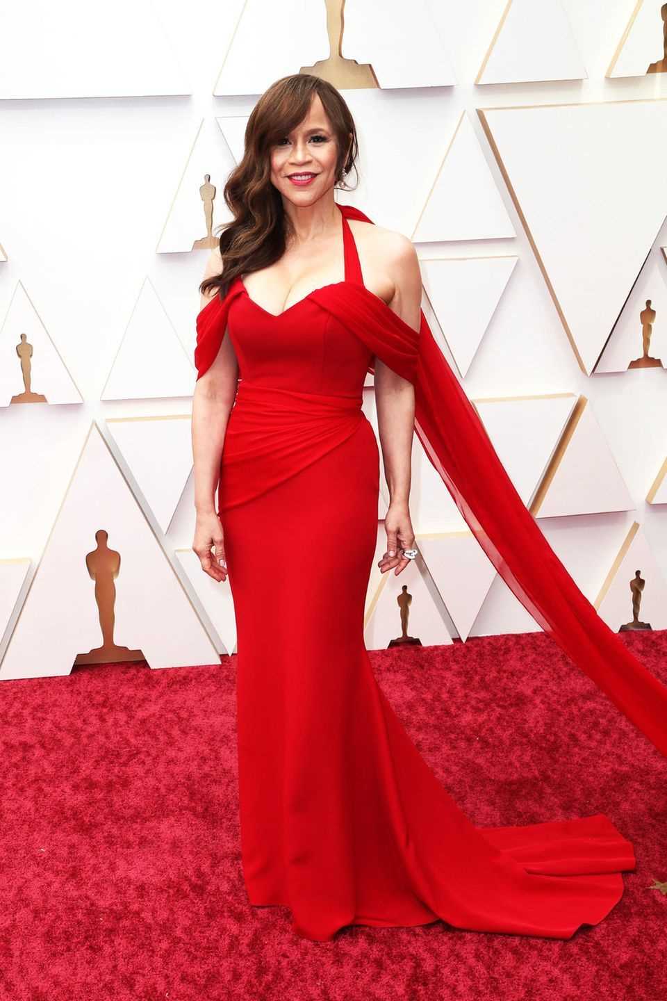Rosie Perez charmed in red by Christian Siriano.