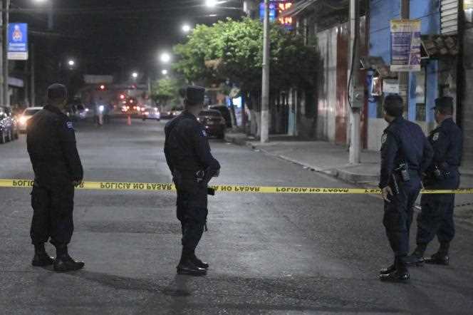 At the scene of a homicide in Colon, Salvador, Saturday, March 26, 2022.