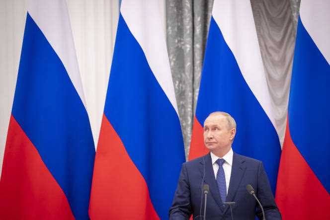 Vladimir Putin attends a press conference at the Kremlin in Moscow, Russia, Monday February 7, 2022