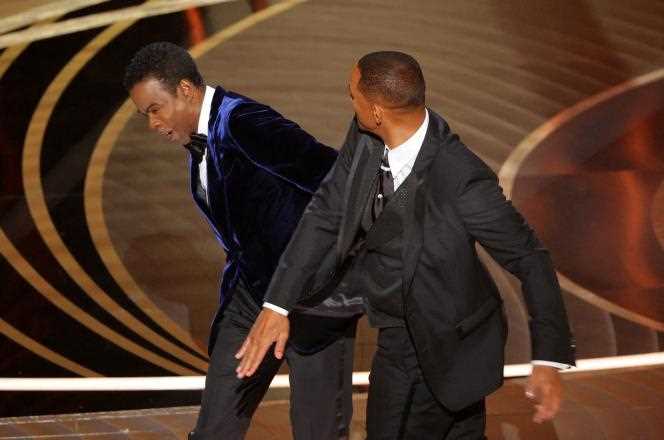 Will Smith slaps Chris Rock during the Academy Awards in Los Angeles on March 27, 2022.