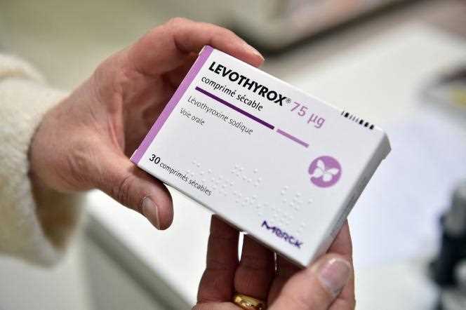 A pharmacist holds a package of the thyroid drug Levothyrox, manufactured by the German pharmaceutical company Merck, in Saint-Gaudens (Haute-Garonne), December 4, 2017.
