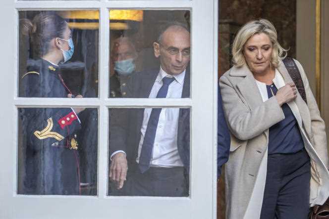 Presidential candidates Eric Zemmour and Marine Le Pen leave the Hôtel de Matignon in Paris on February 28, 2022.