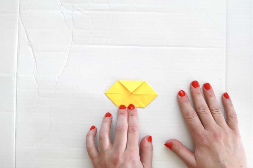 Origami animals: fold chicken Step 6