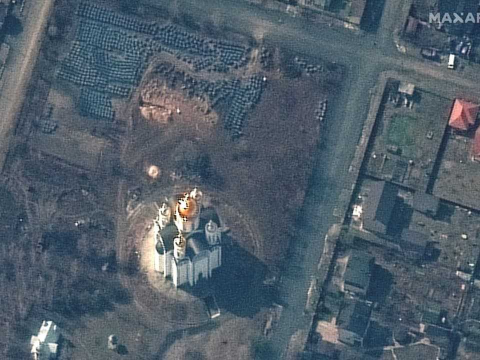 The satellite photo of the church in Bucha dated March 31 shows a possible mass grave on the site.