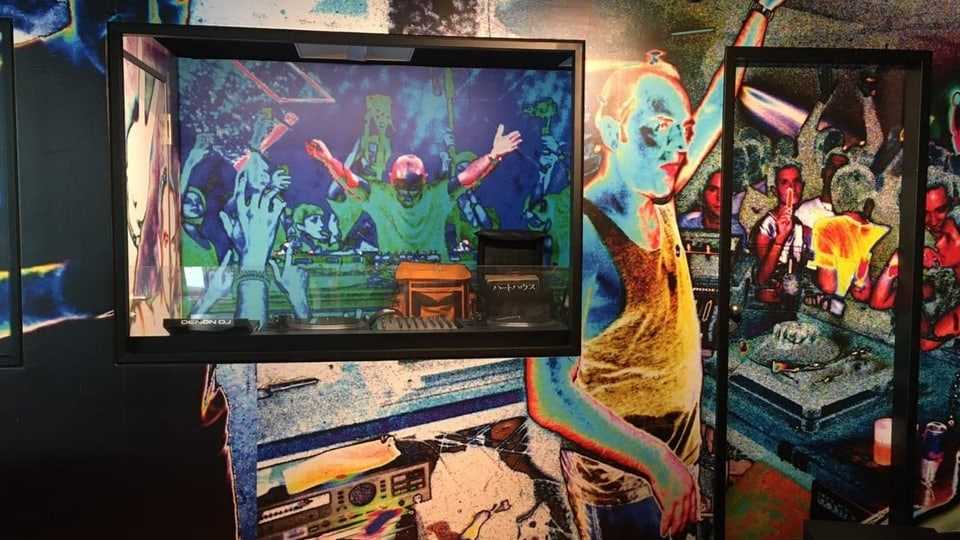 Colorful installation with photos from a club