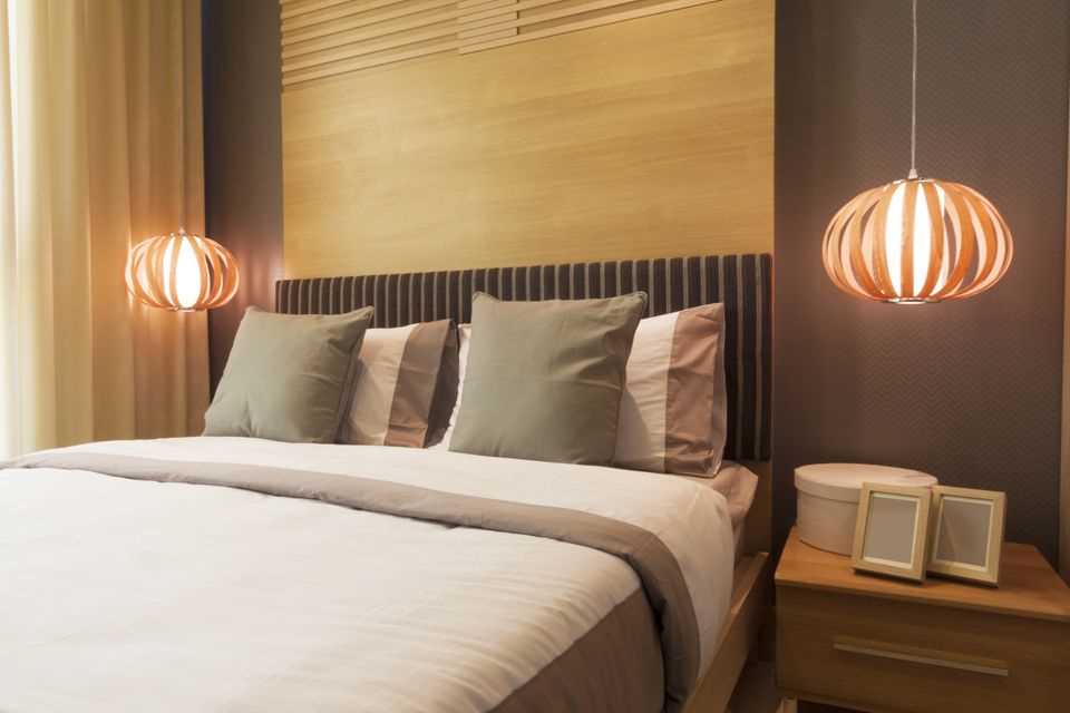 Make bedroom more comfortable: bed illuminated with warm light