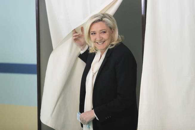 Marine Le Pen voting in northern France.