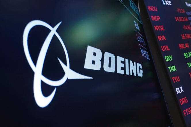 Boeing's logo on a screen at the New York Stock Exchange, July 13, 2021. The announcement of $1.24 billion in first-quarter losses on April 17, 2022 sent its stock price plummeting on the financial markets. 