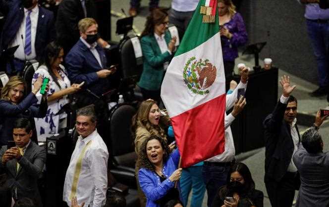 Opposition deputies celebrate the rejection of the constitutional reform project strengthening public electricity production to the detriment of the private sector defended by President Andres Manuel Lopez Obrador, at the Congress in Mexico City, April 17, 2022. 