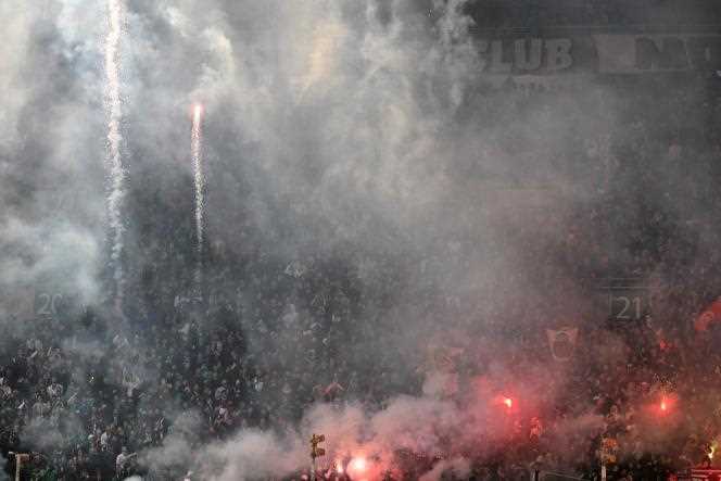 Saint-Etienne supporters lit smoke bombs during the match against Monaco, Saturday April 23, 2022.