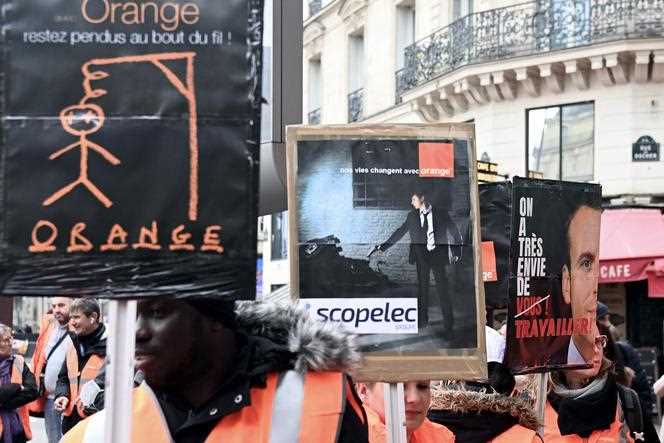Scopelec employees demonstrate in Paris, April 7, 2022.