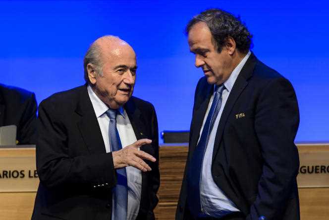 Sepp Blatter, FIFA President from 1998 to 2015, and Michel Platini, UEFA President from 2007 to 2015, in June 2014, in Sao Paulo (Brazil).