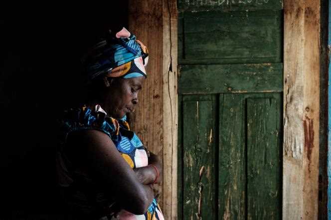 Laetitia Ngendakumana, whose father was arrested and killed in the 1972 massacres, at her home near Gitega, Burundi, March 11, 2022. 