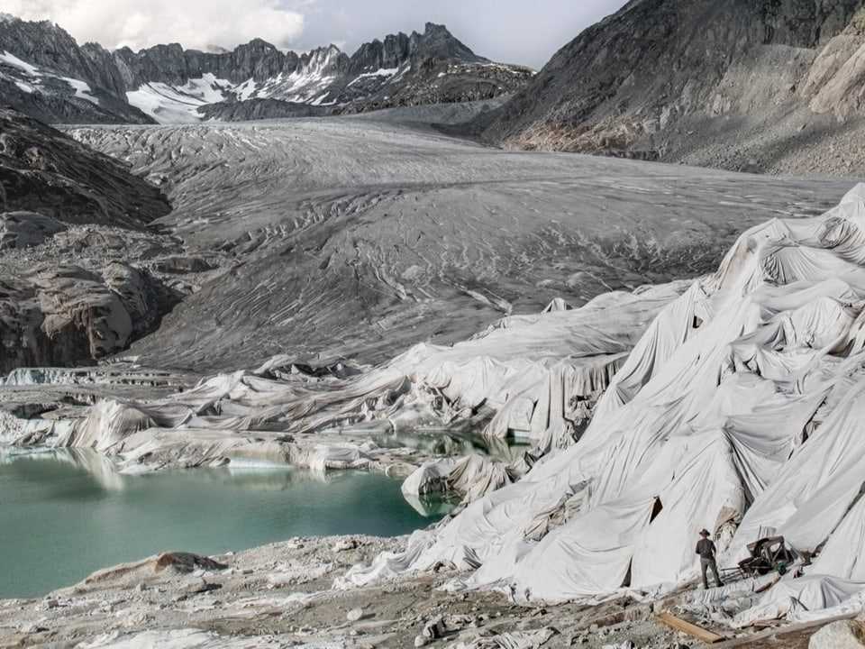 Glacier covered with tarpaulins, you can see how the ice recedes over the years