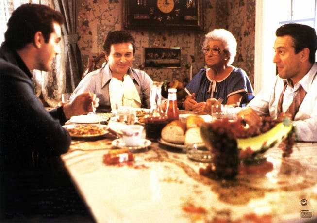 Where is it best?  With mom, of course, especially when she's cooking pasta.  This is also the case in mafia families.  Film still from «Goodfellas» (1993).
