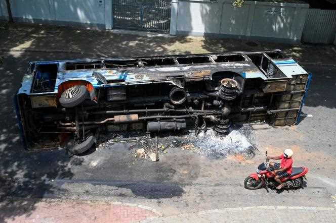 A bus set on fire during protests against the government in Sri Lanka, in Colombo, May 11, 2022.