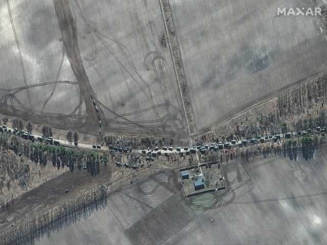 Aerial photo: Street full of military vehicles