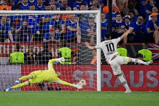 Serbian player Filip Kostic scores one of Eintracht's shots on goal in the Europa League final against Glasgow Rangers in Seville on May 18, 2022.