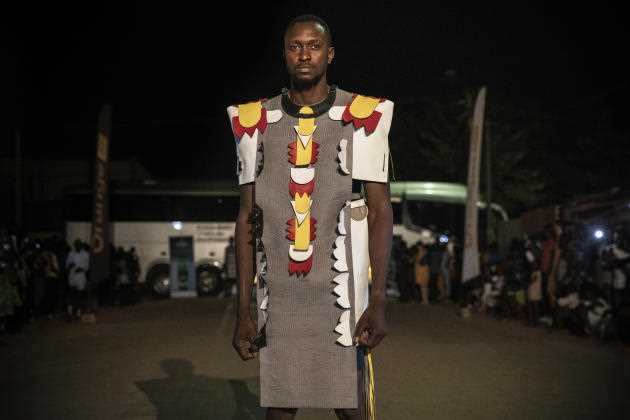 A model wears a POCO&CO brand dress during Ouaga Fashion Week in Ouagadougou, Burkina Faso, Saturday, May 14, 2022.