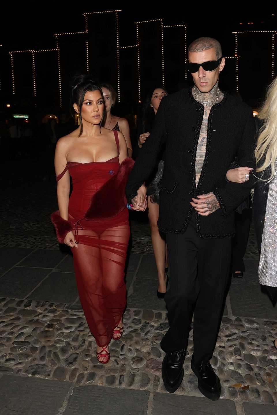Kourtney Kardashian and Travis Barker on the first night of their three-day wedding reception.