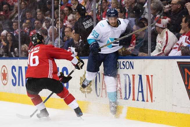 Canada's Jonathan Toews (left) against Roman Josi of Team Europe, at the 2016 World Cup of Hockey.