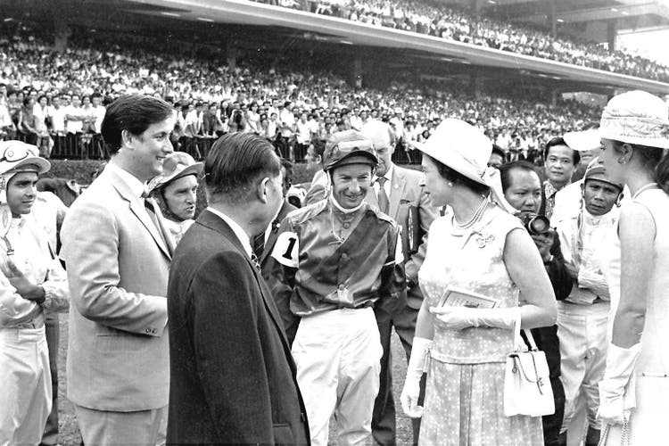 Queen Elizabeth II congratulates Lester Piggott on his victory in Singapore in September 1972.