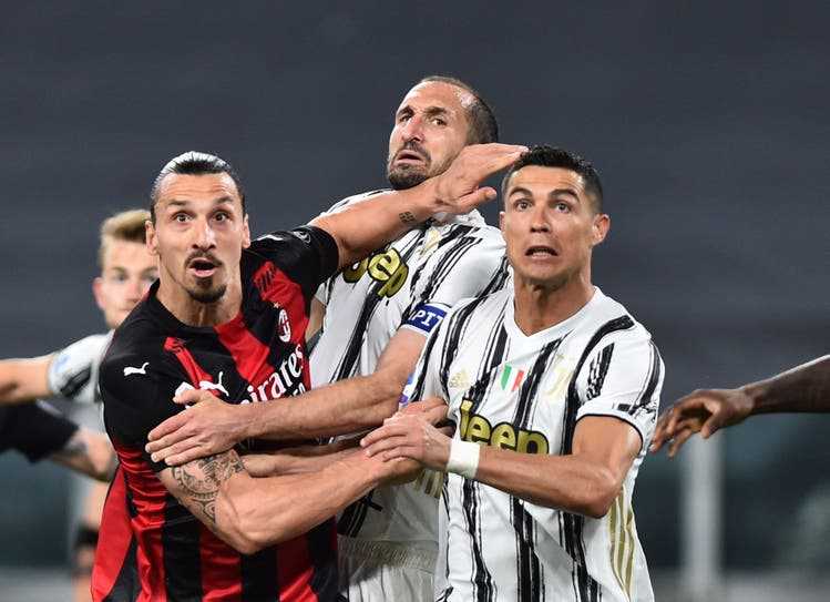 In the midst of world stars: Giorgio Chiellini in a duel with Milan's Zlatan Ibrahimovic (left), with whom he gets along well off the field, to his right is his prominent teammate Cristiano Ronaldo.
