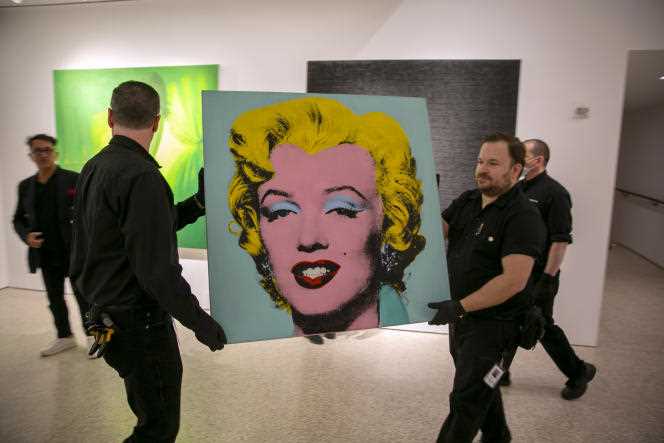 Andy Warhol's 'Shot Sage Blue Marilyn' portrait is transported to Christie's auction house in New York on May 8, 2022. 