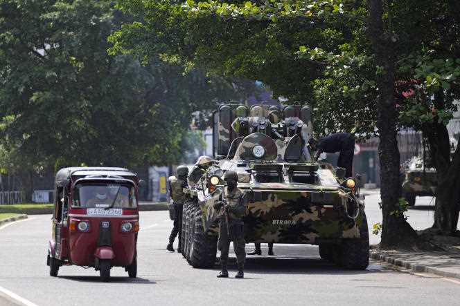 Sri Lankan army soldiers patrol during the curfew in Colombo, Sri Lanka, May 11, 2022.