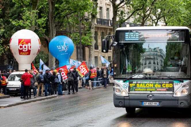 Bus drivers from the Autonomous Paris Transport Authority (RATP) demonstrate in front of the Ministry of Transport in Paris, on May 23, 2022, against the new working conditions.