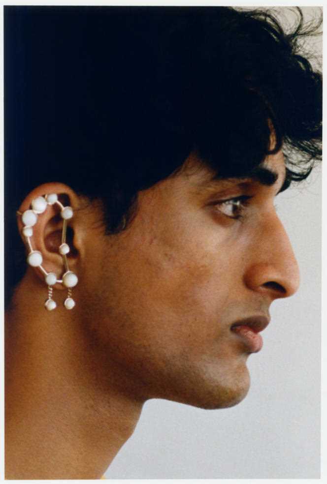 Gemini earring, in brass, moonstone and white stone, Chloé, €410.  chloe.com